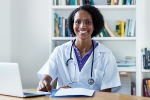 African-American nurse with a laptop